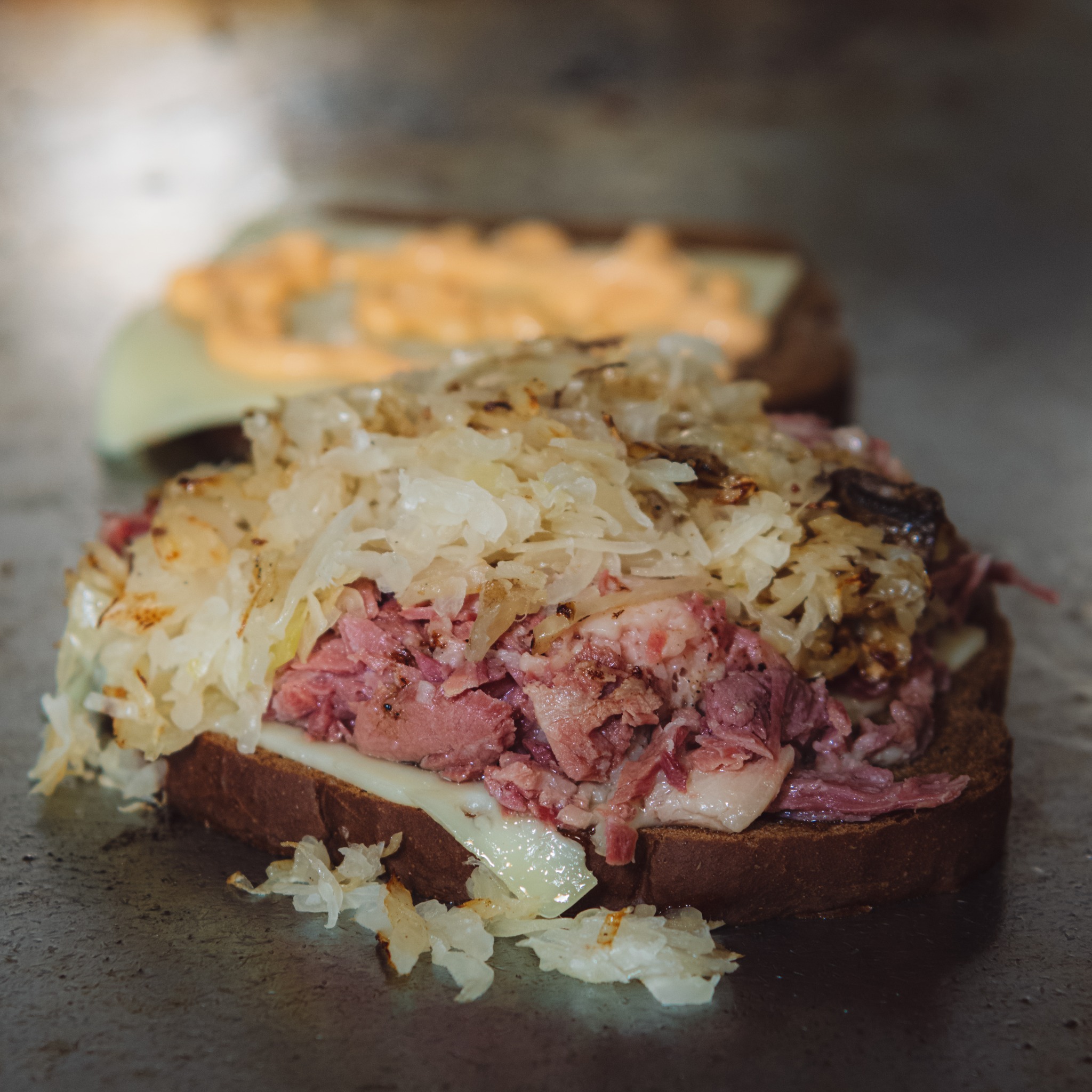 reuben sandwich on the grill